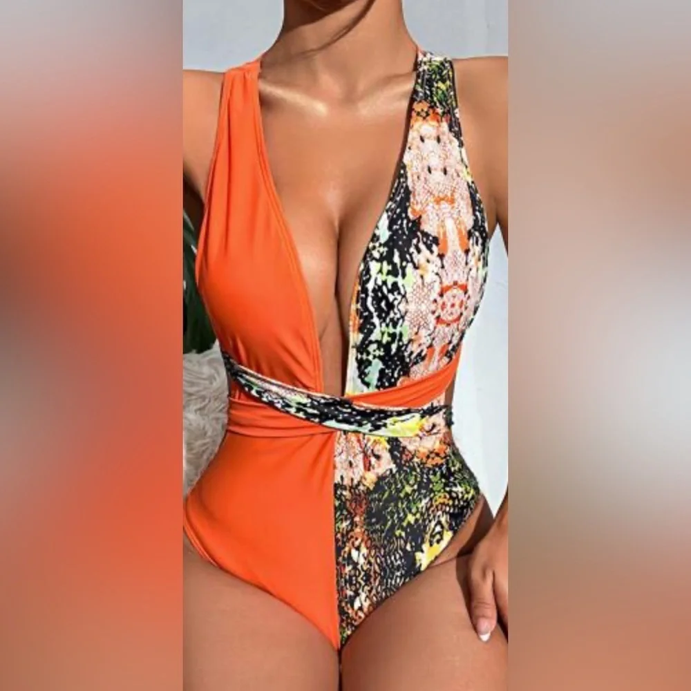 NWOT plunge neck one piece women’s swimsuit